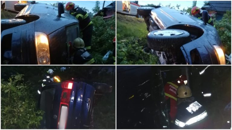 FOTO Două femei au rămas blocate într-o mașină răsturnată într-un șanț, la Milișăuți